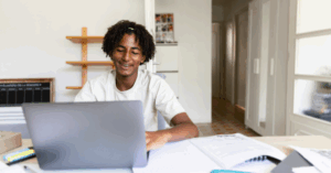 Content Grade 12 learner participating in a digital learning experience akin to winter school.